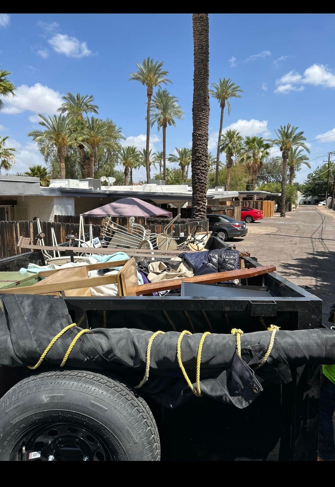 Trailer loaded with furniture and household items from a Phoenix cleanout