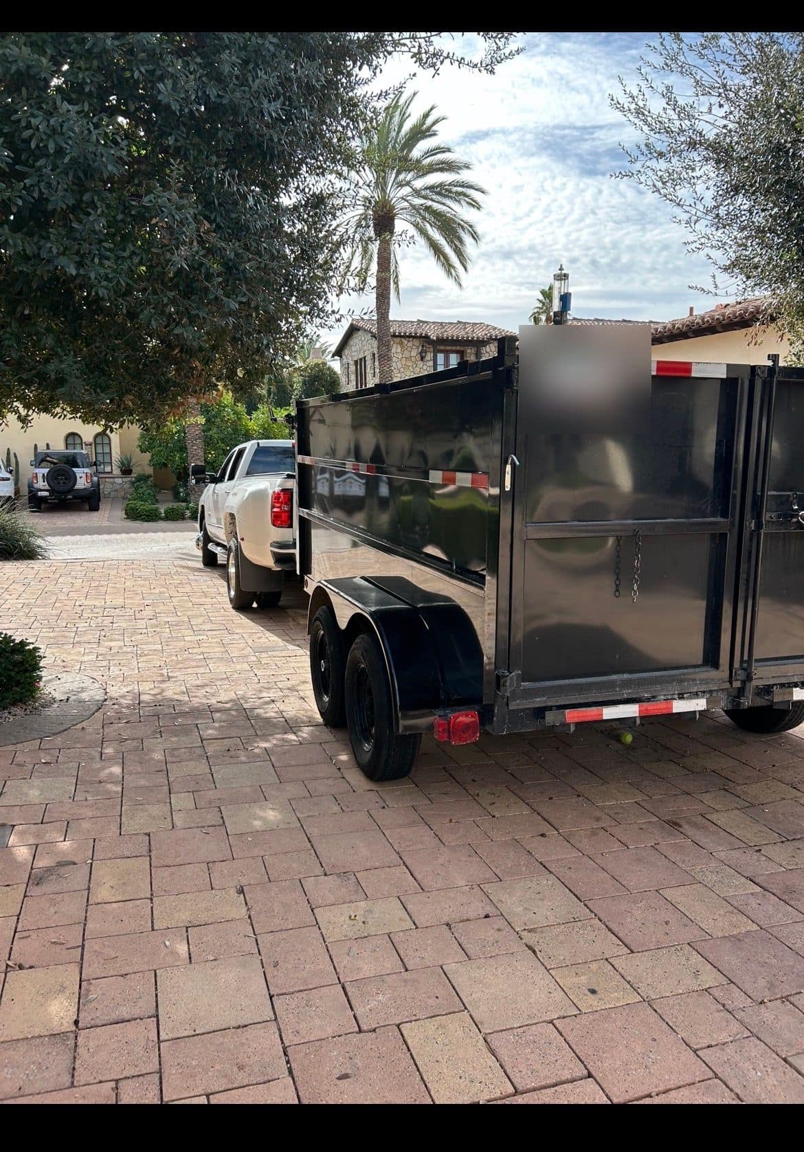 AZ Junk Pros truck and trailer at a residential single-item pickup